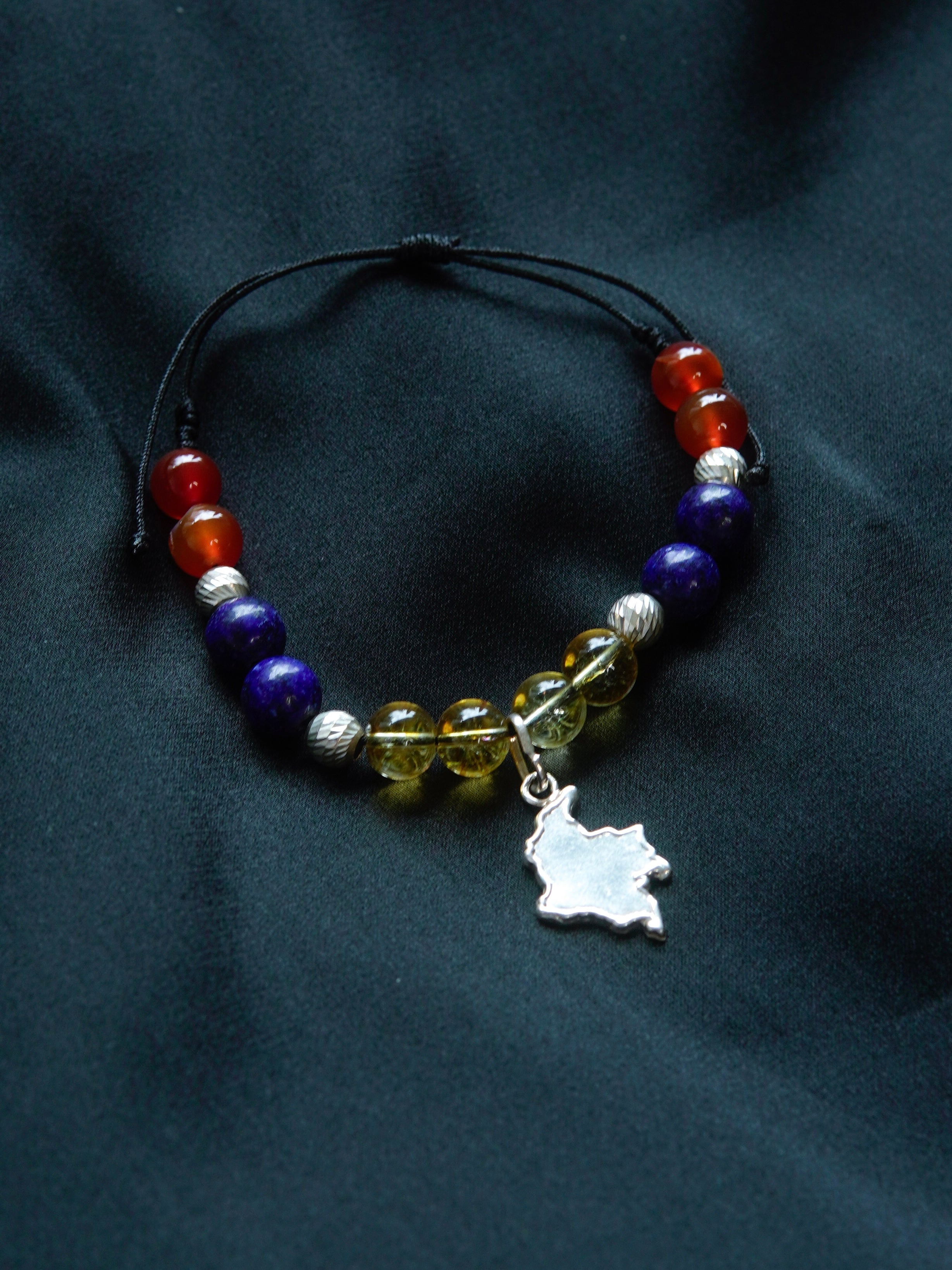 PULSERA COLOMBIA. DIJE 1.78GR- BOLAS 1GR 2.78gr / Plata