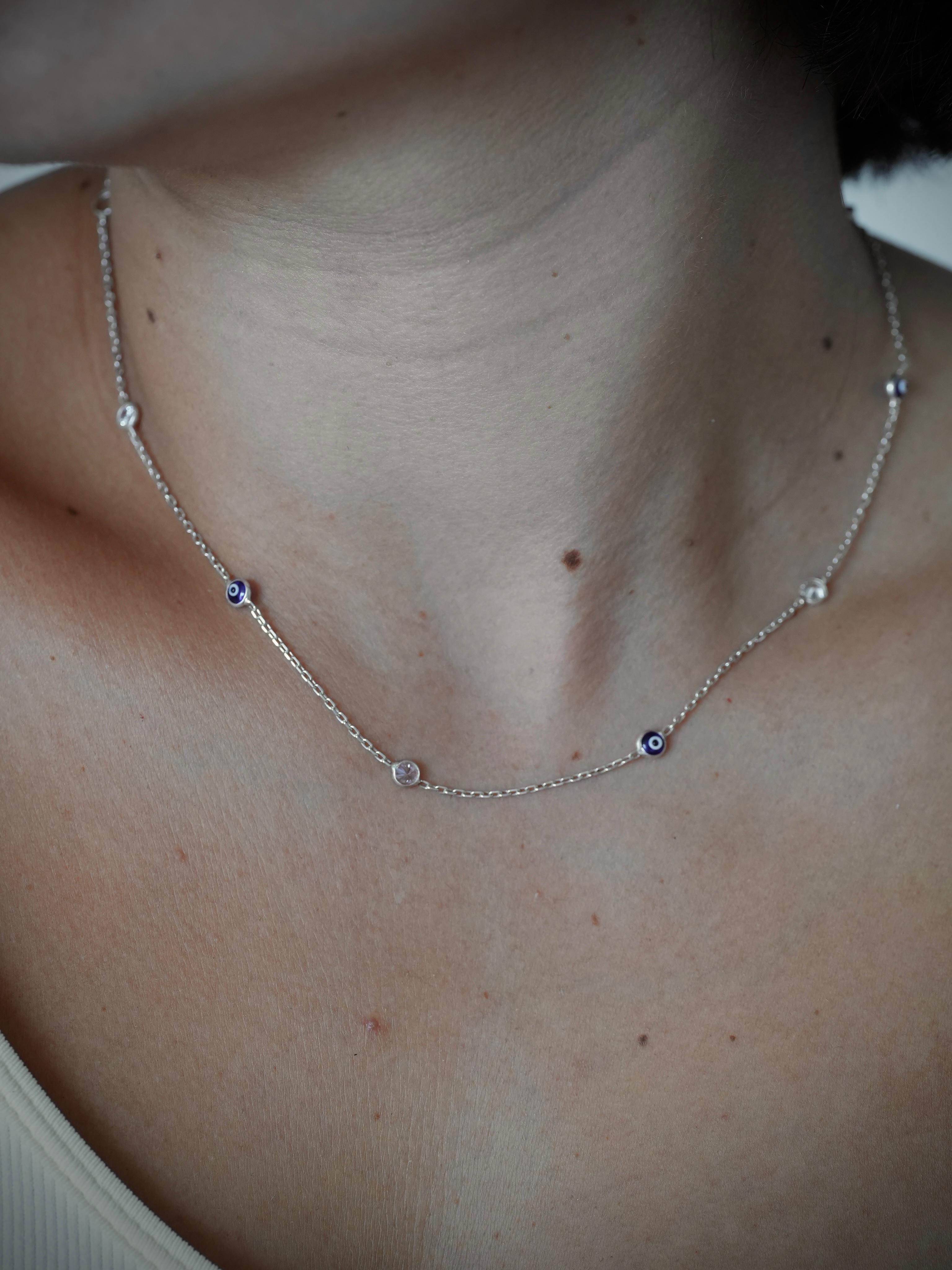CADENA PAPER CLIP CON OJOS AZULES
