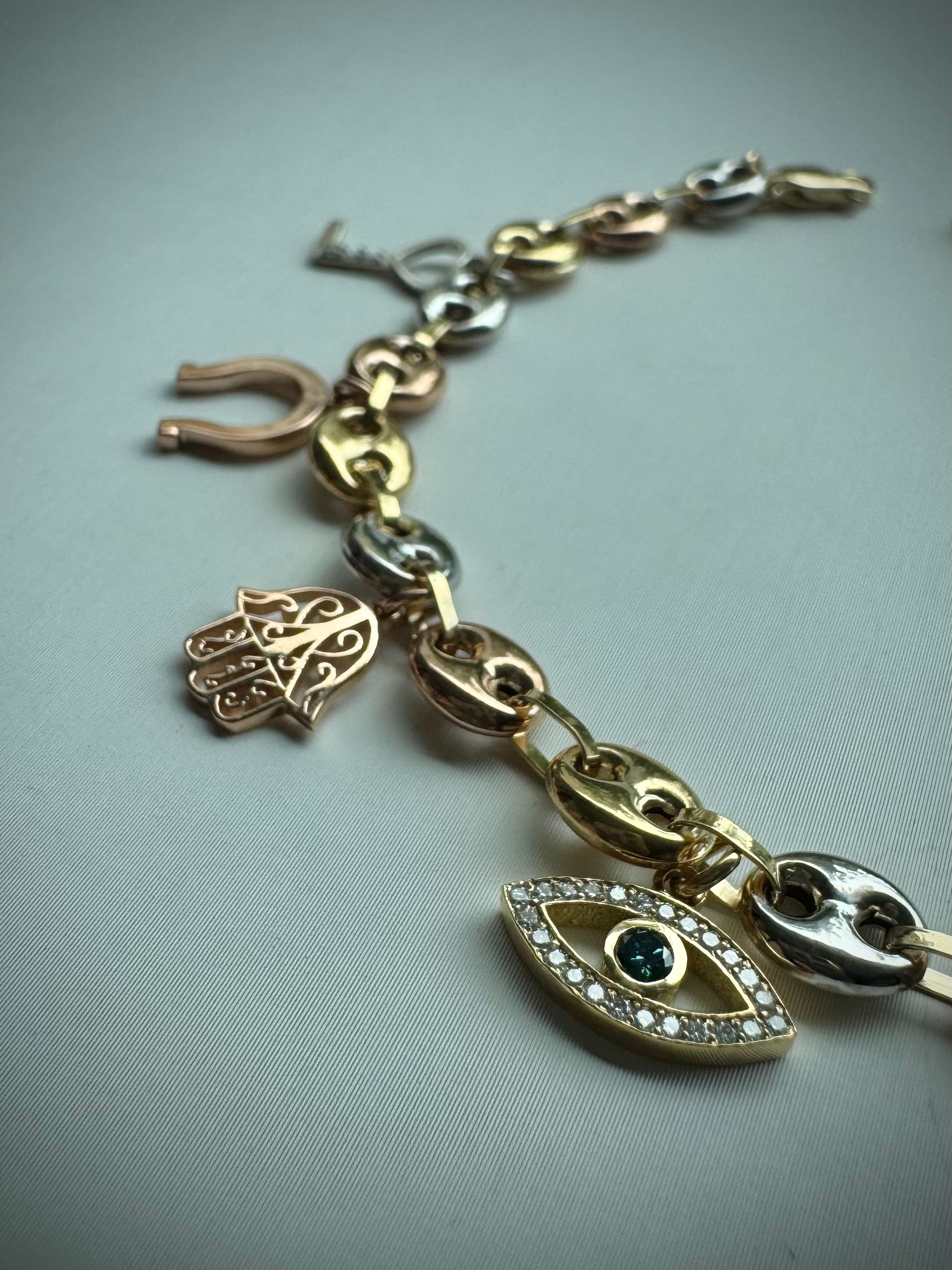 TOBILLERA 8 AMULETOS 0,22 CTS DIAMANTES / ORO AMARILLO 13GR