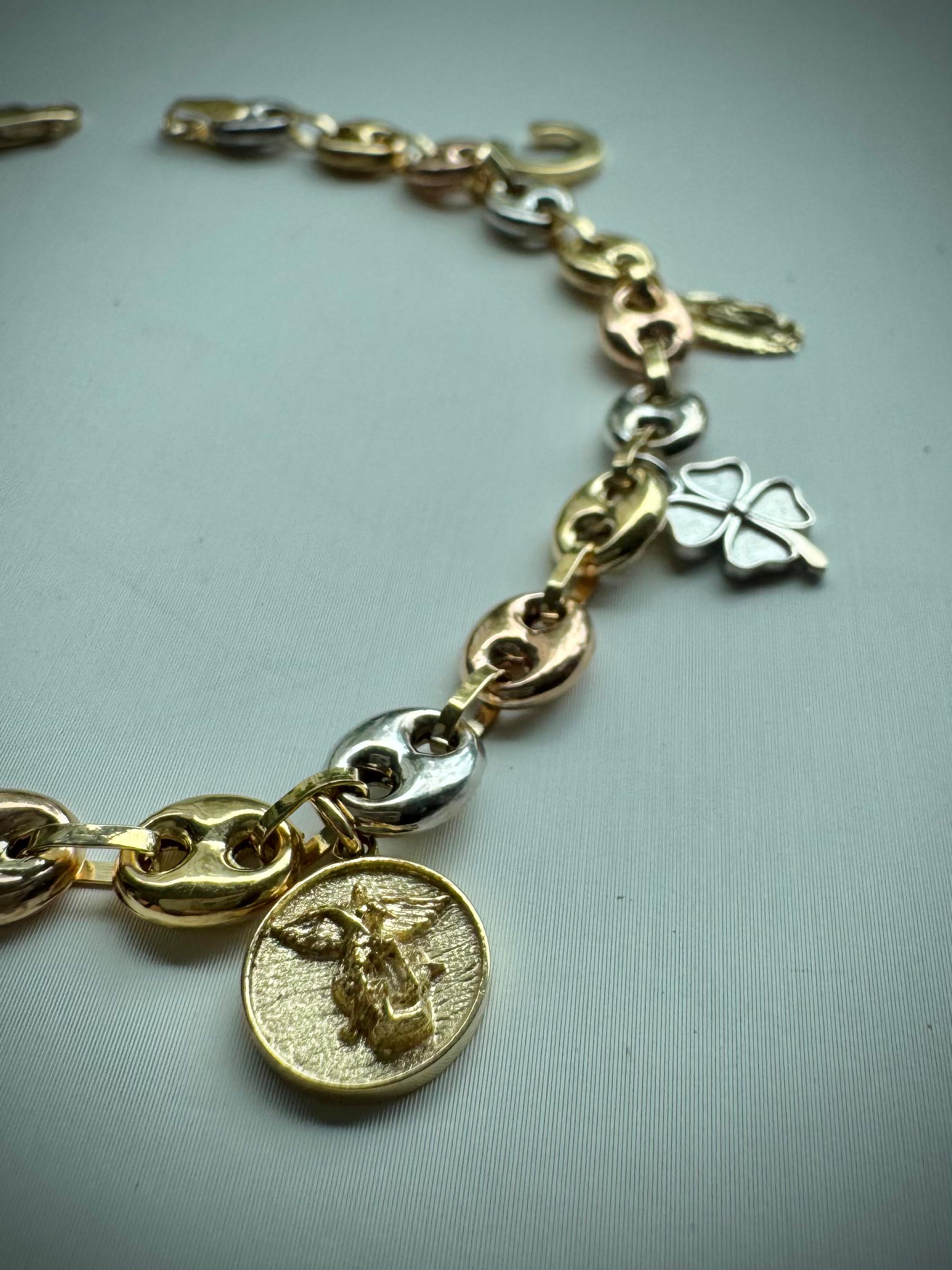 TOBILLERA 8 AMULETOS 0,22 CTS DIAMANTES / ORO AMARILLO 13GR