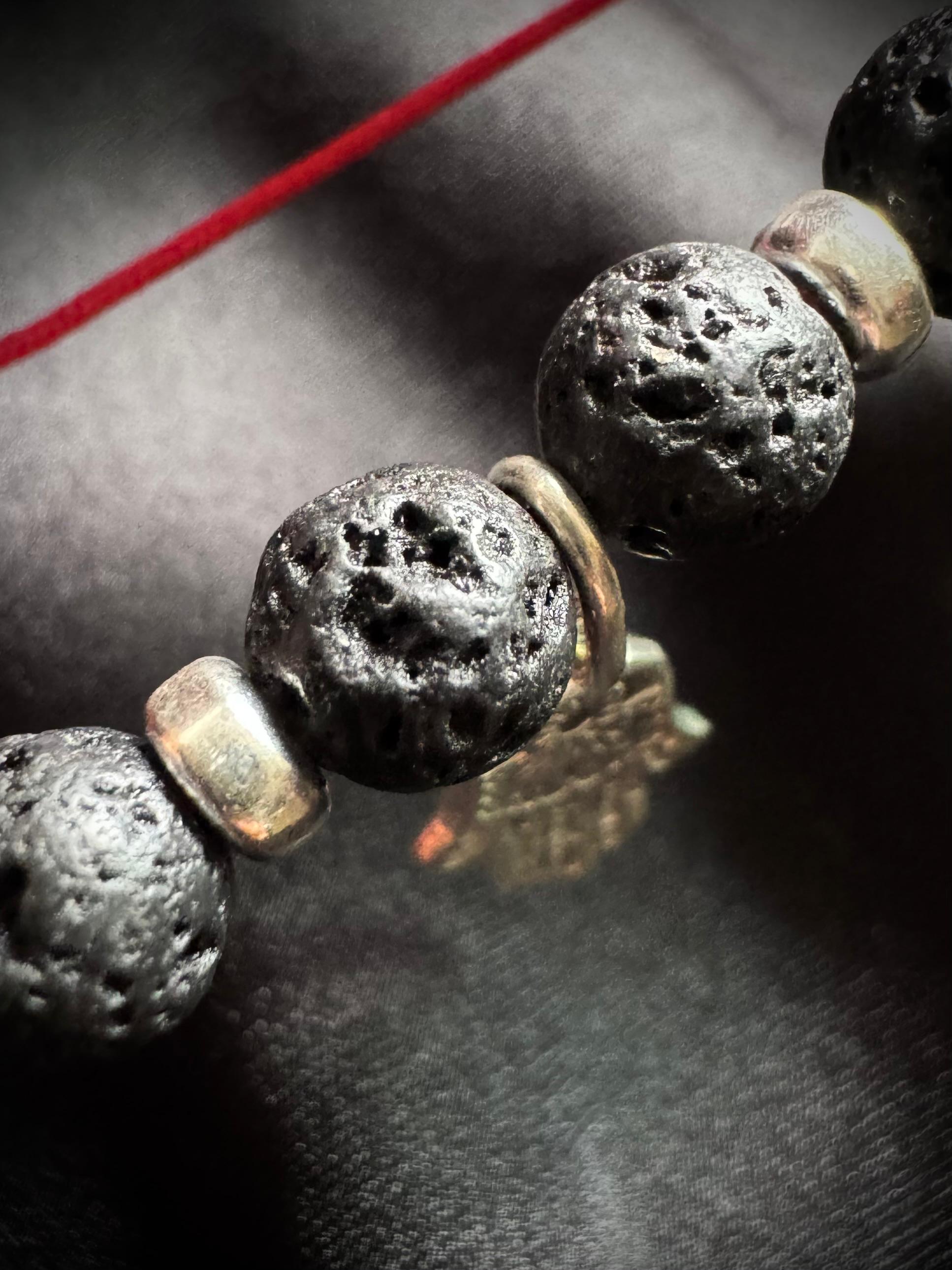 PULSERA MANO HAMSA VOLCANICA