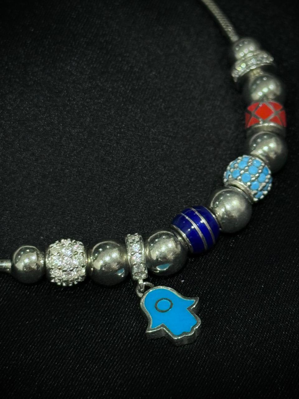 PULSO CHARMS SLEEVE MANO HAMSSA BOLA DE FUEGO